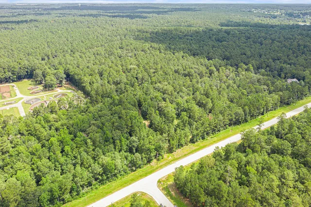 a view of a yard with an outdoor seating
