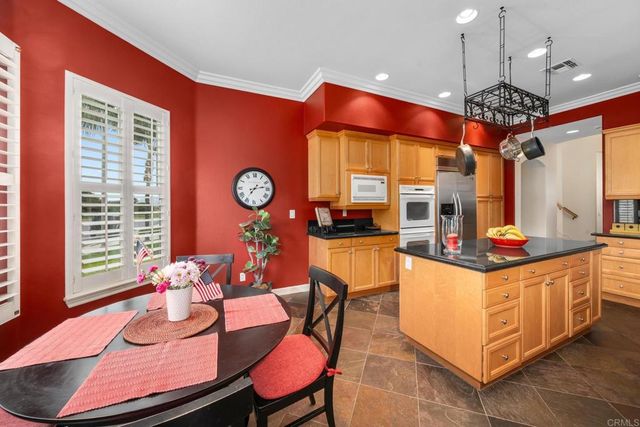 a view of a livingroom with workspace and a couch