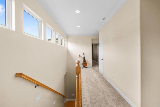 a view of workspace with wooden floor windows