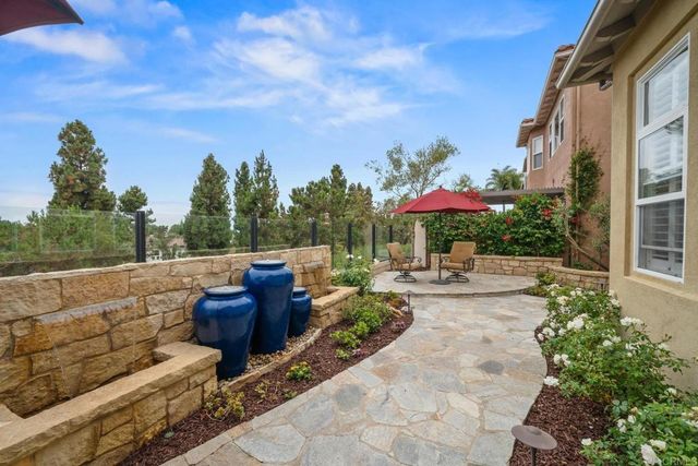 an aerial view of a house with a garden
