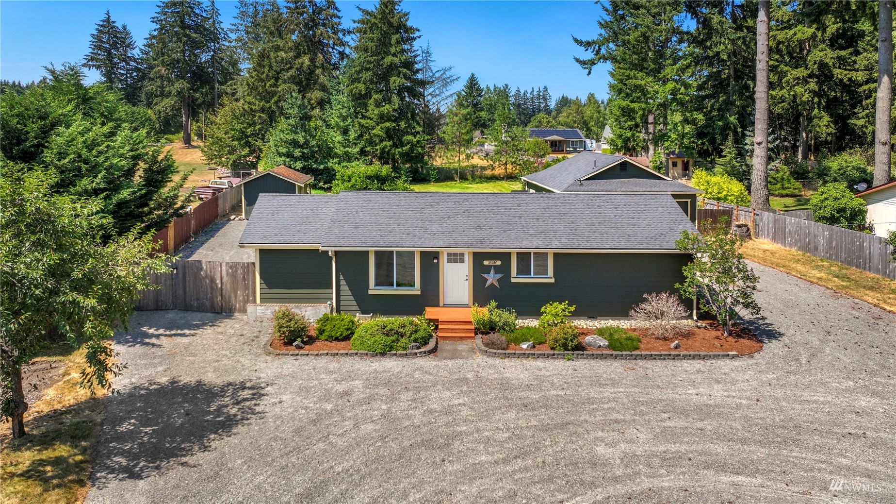 19027 Nutmeg Street Southwest Rochester, WA 98579 - Photo 1 of 22 front view of a house with yard