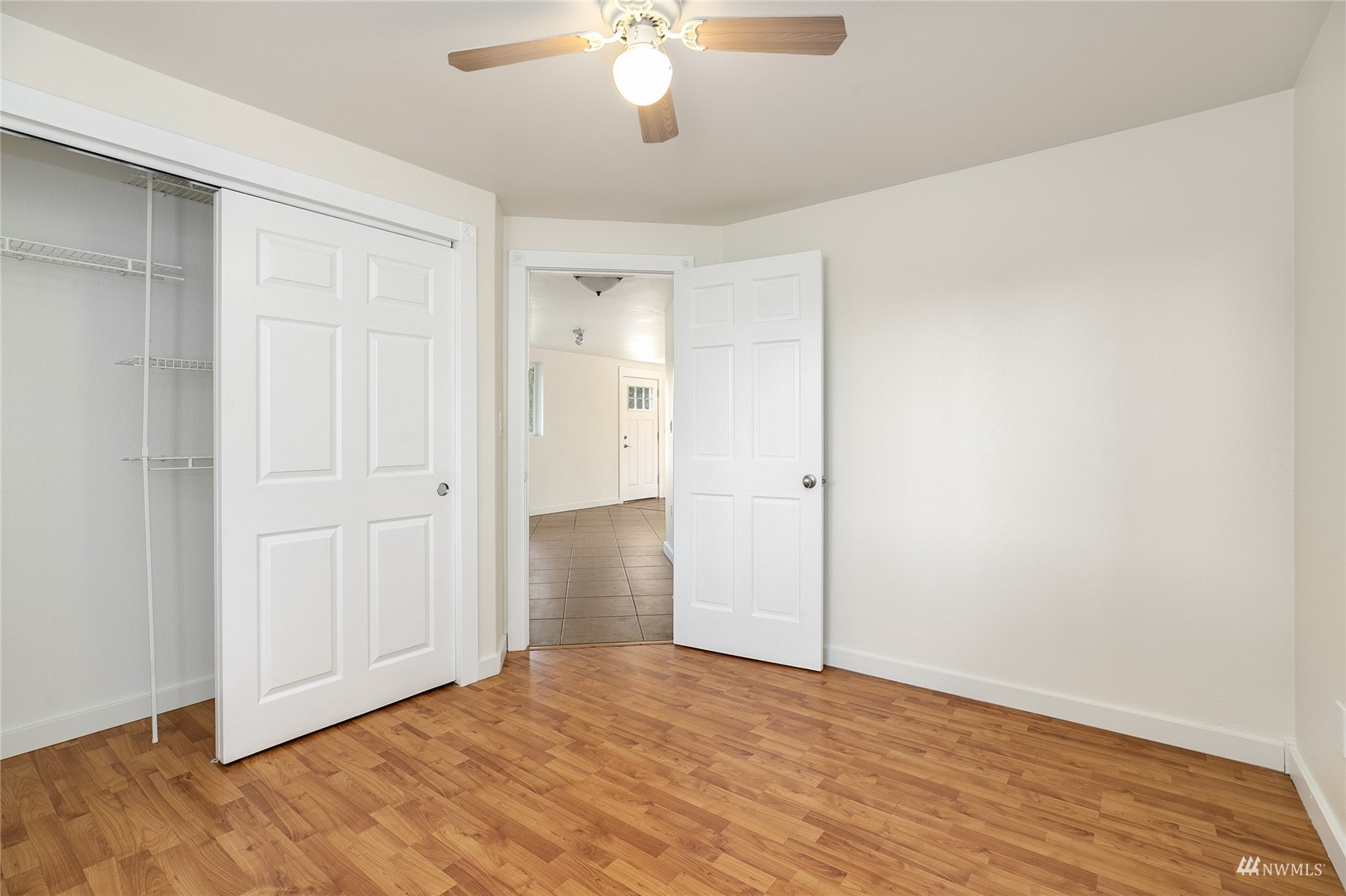19027 Nutmeg Street Southwest Rochester, WA 98579 - Photo 12 of 22 a view of an empty room with wooden floor