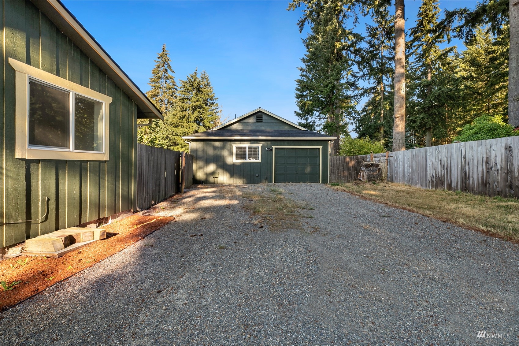 19027 Nutmeg Street Southwest Rochester, WA 98579 - Photo 17 of 22 a front view of a house with a yard