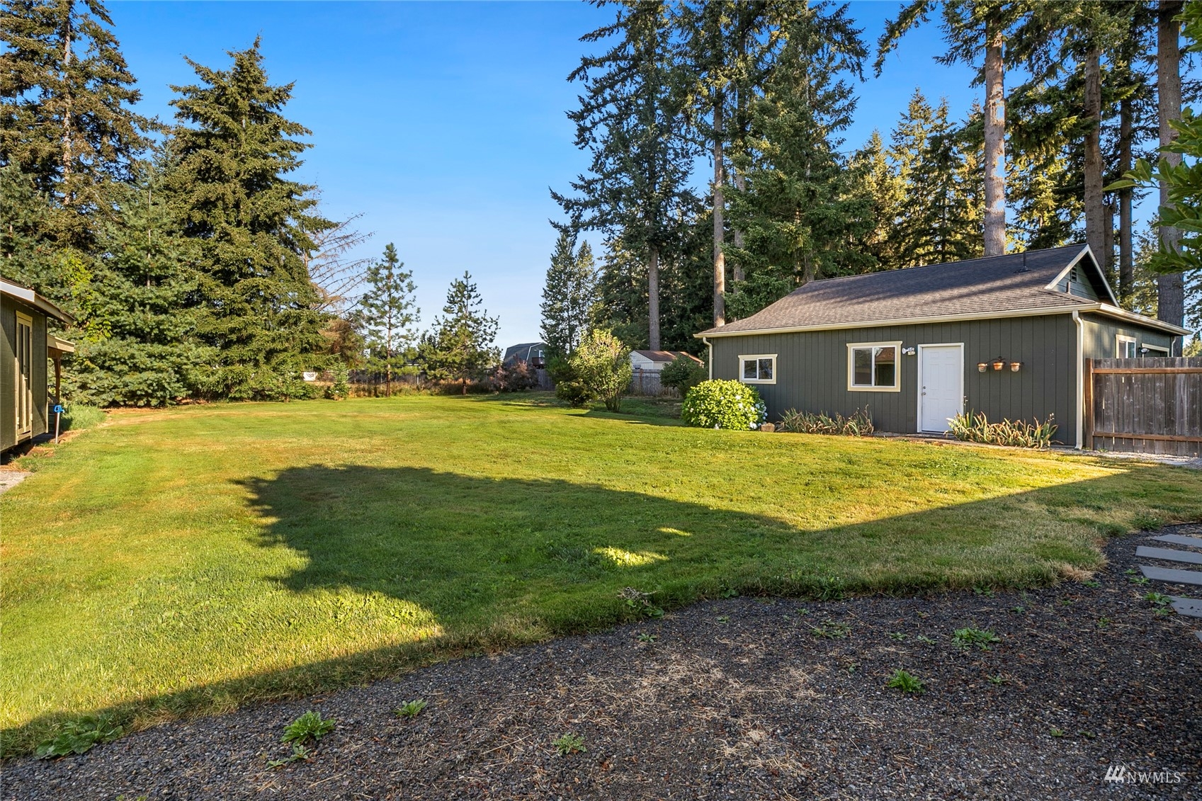 19027 Nutmeg Street Southwest Rochester, WA 98579 - Photo 20 of 22 a view of a house with a yard