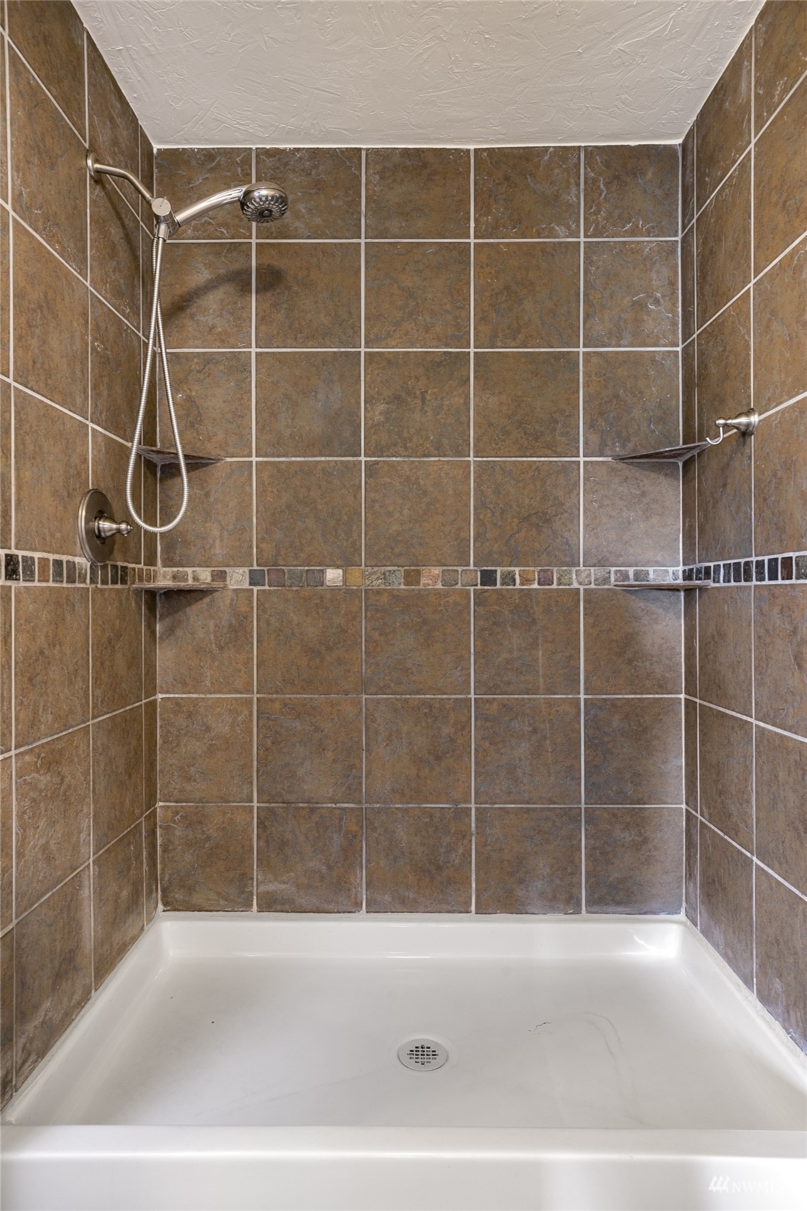 19027 Nutmeg Street Southwest Rochester, WA 98579 - Photo 9 of 22 a bathroom with a shower
