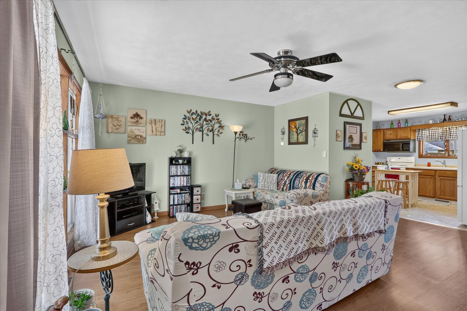 1204 West Violet Street Freeport, IL 61032 - Photo 11 of 36 a living room with furniture and wooden floor