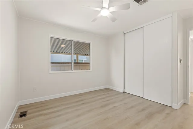 a bathroom with a granite countertop sink a shower and a mirror