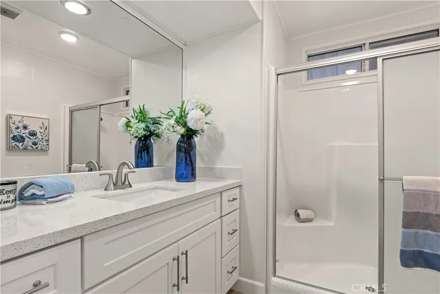 a couple of chairs sitting on a roof deck