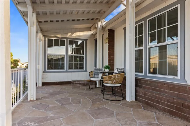 a living room with a couch and a window