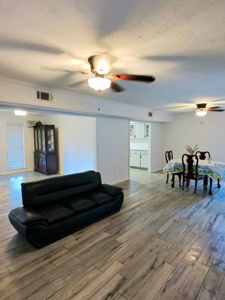 4715 Teak Drive Columbus, GA 31909 - Photo 4 of 19 a living room with furniture and wooden floor