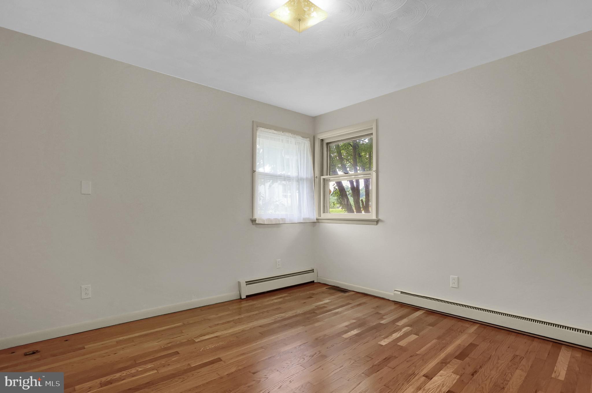851 Lewisberry Road Lewisberry, PA 17339 - Photo 17 of 41 Third bedroom also with refinished hardwood floors