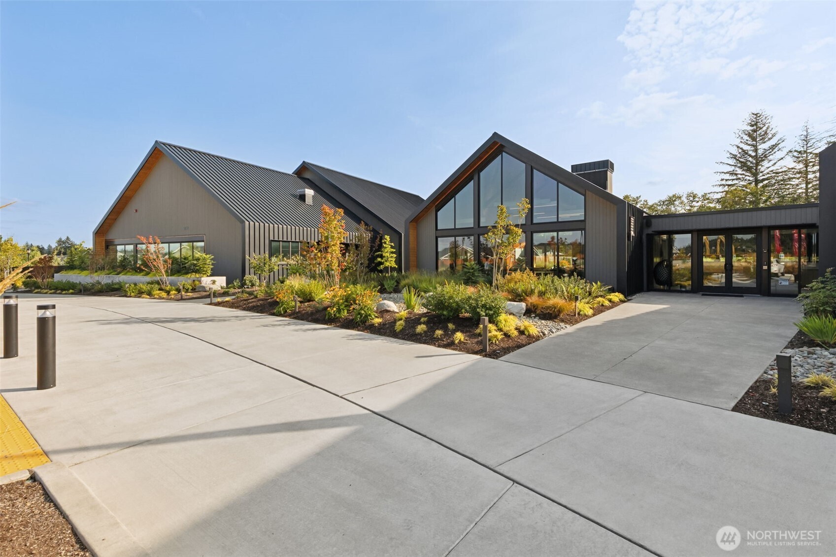 3111 Arrowroot Loop Southeast Olympia, WA 98513 - Photo 23 of 34 a front view of a house with garden