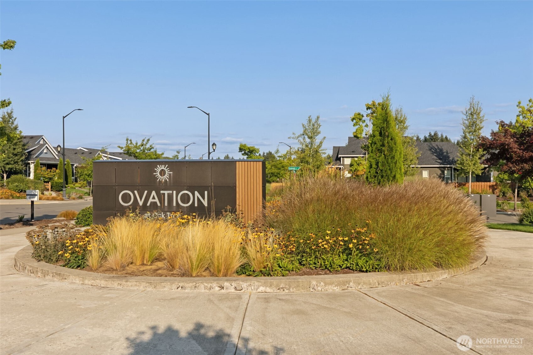 3111 Arrowroot Loop Southeast Olympia, WA 98513 - Photo 34 of 34 a sign that is on the side of the road
