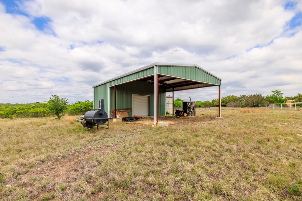3276 Link Doss, TX 78618 - Photo 6 of 44 a view of a house with backyard and porch