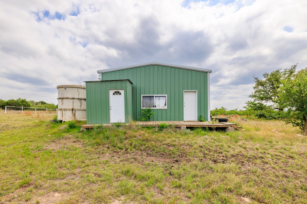 3276 Link Doss, TX 78618 - Photo 10 of 44 a front view of a house with a yard