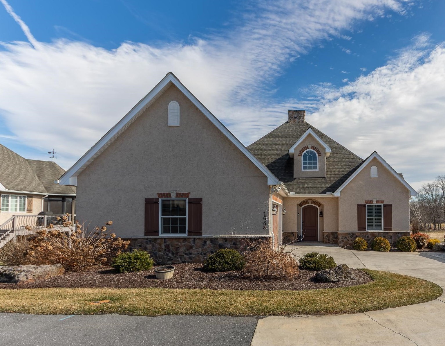 1685 Bald Eagle Circle Harrisonburg, VA 22801 - Photo 2 of 53 a front view of a house with garden
