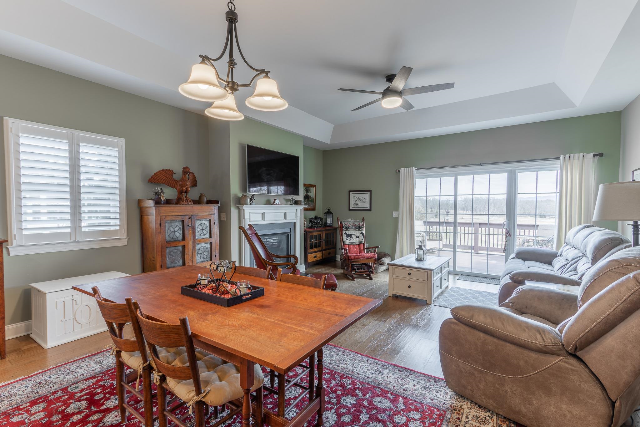 1685 Bald Eagle Circle Harrisonburg, VA 22801 - Photo 27 of 53 a living room with furniture a flat screen tv and a large window