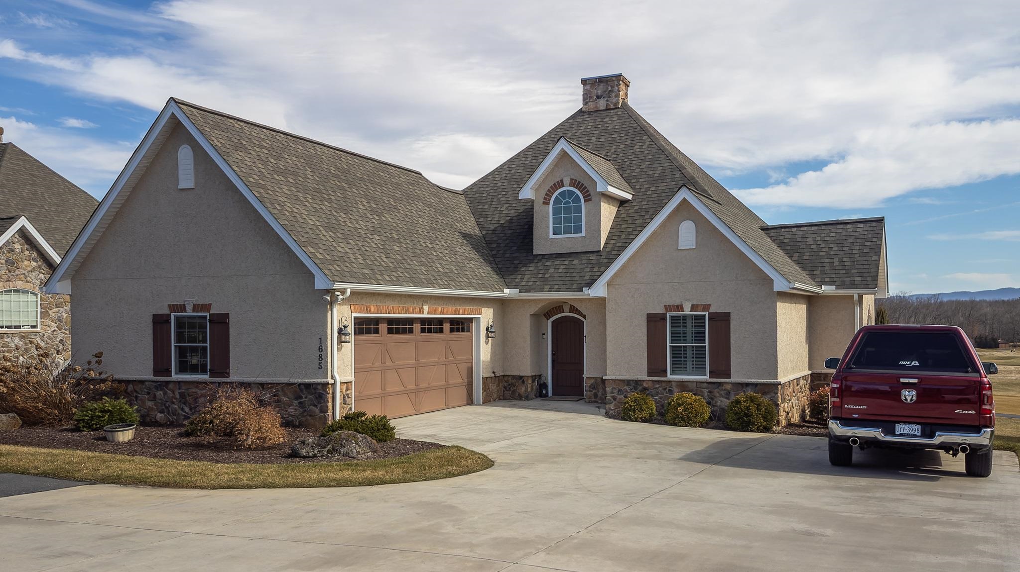 1685 Bald Eagle Circle Harrisonburg, VA 22801 - Photo 3 of 53 a front view of a house with a yard
