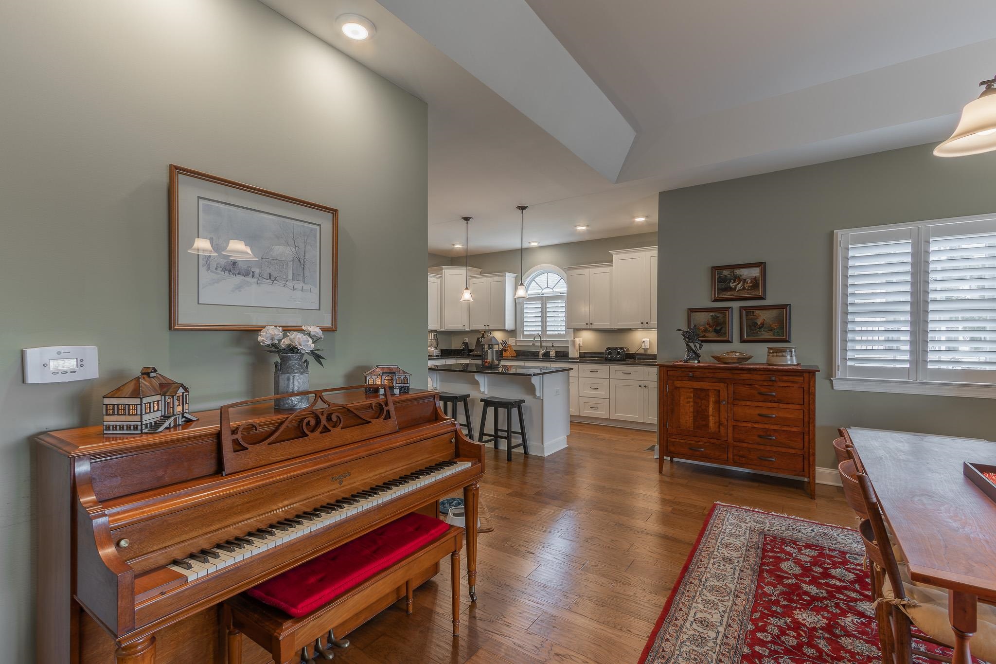 1685 Bald Eagle Circle Harrisonburg, VA 22801 - Photo 40 of 53 a open kitchen with a table and chairs