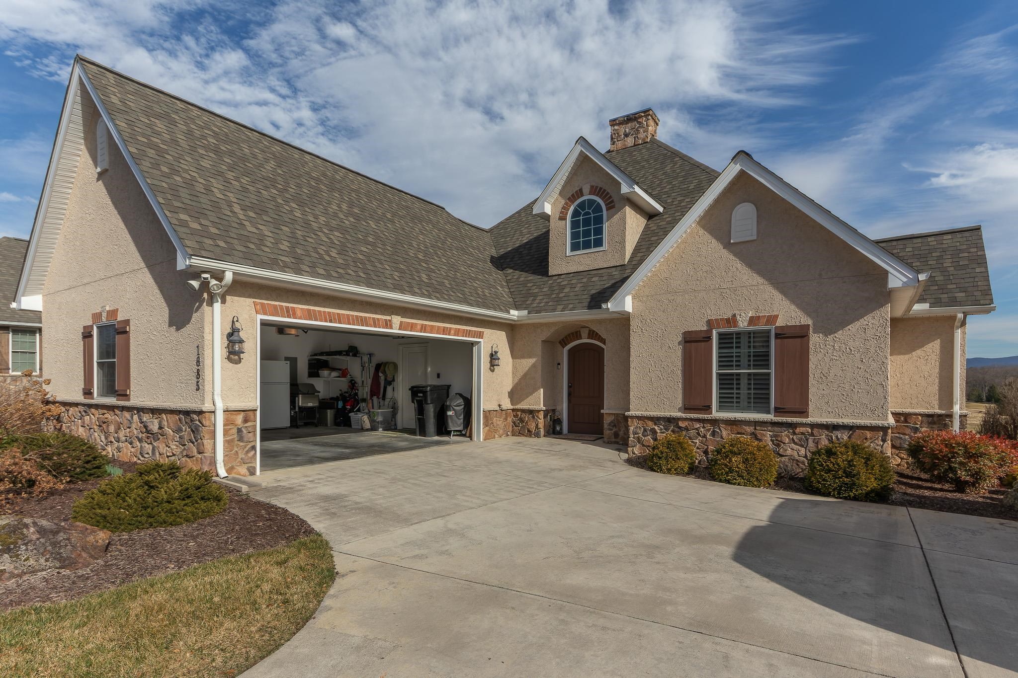 1685 Bald Eagle Circle Harrisonburg, VA 22801 - Photo 4 of 53 a front view of a house with a yard