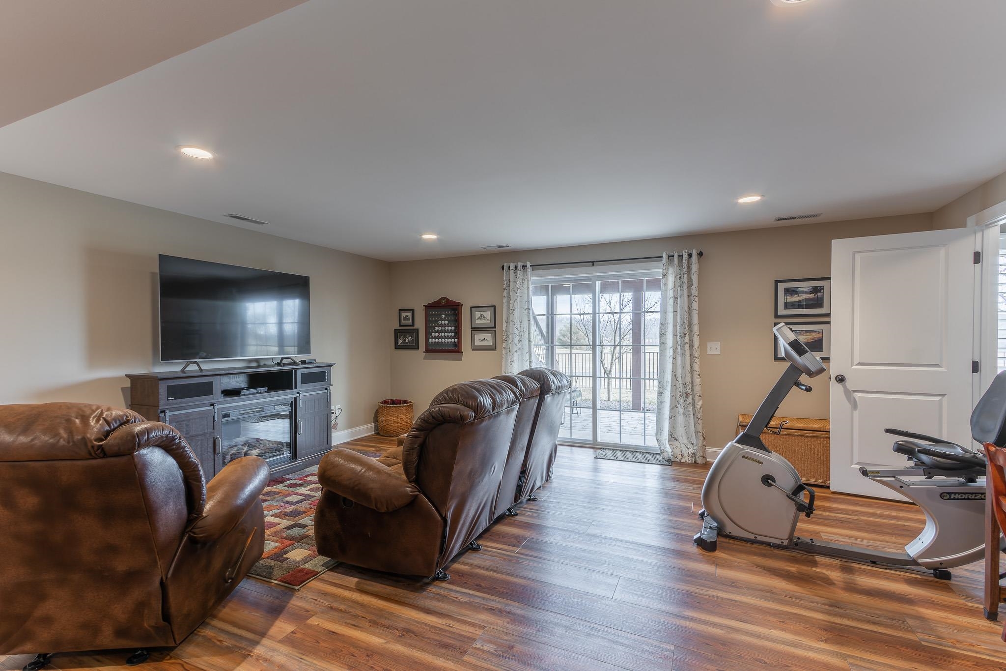 1685 Bald Eagle Circle Harrisonburg, VA 22801 - Photo 49 of 53 a living room with furniture and a flat screen tv