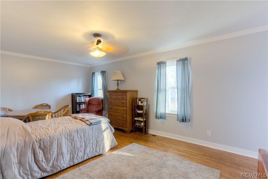 14018 Sagebrook Road Midlothian, VA 23112 - Photo 25 of 28 a bedroom with a bed and dresser