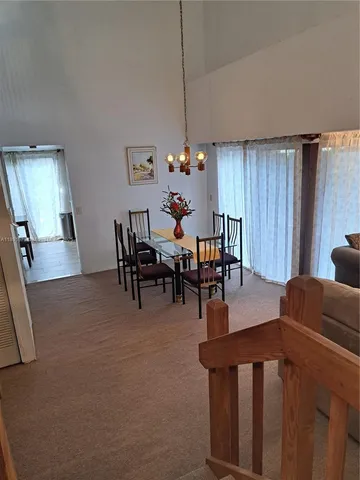 a view of a livingroom and dining room