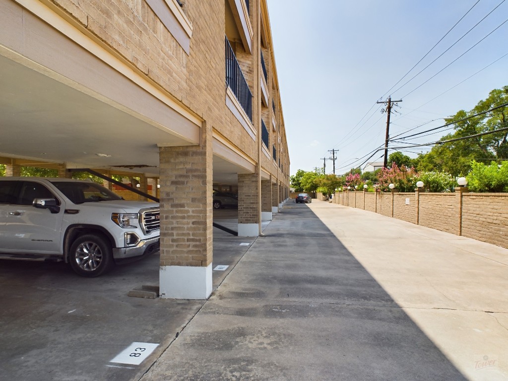3316 Guadalupe Street, Unit 210 Austin, TX 78705 - Photo 11 of 15 a view of a car parked in garage