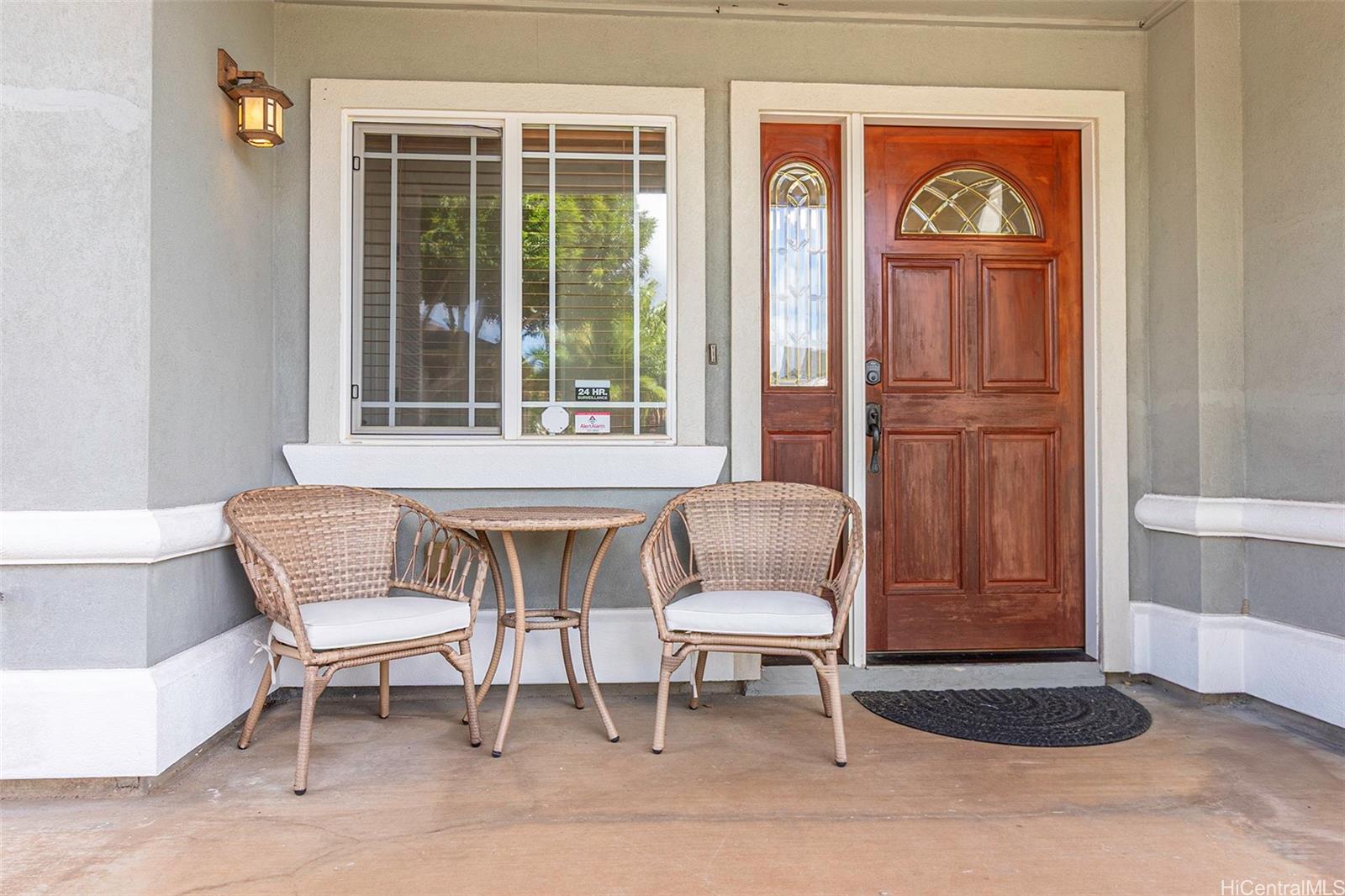92-1087 Palahia Street, Unit B Kapolei, HI 96707 - Photo 14 of 24 a chair and a table in a room