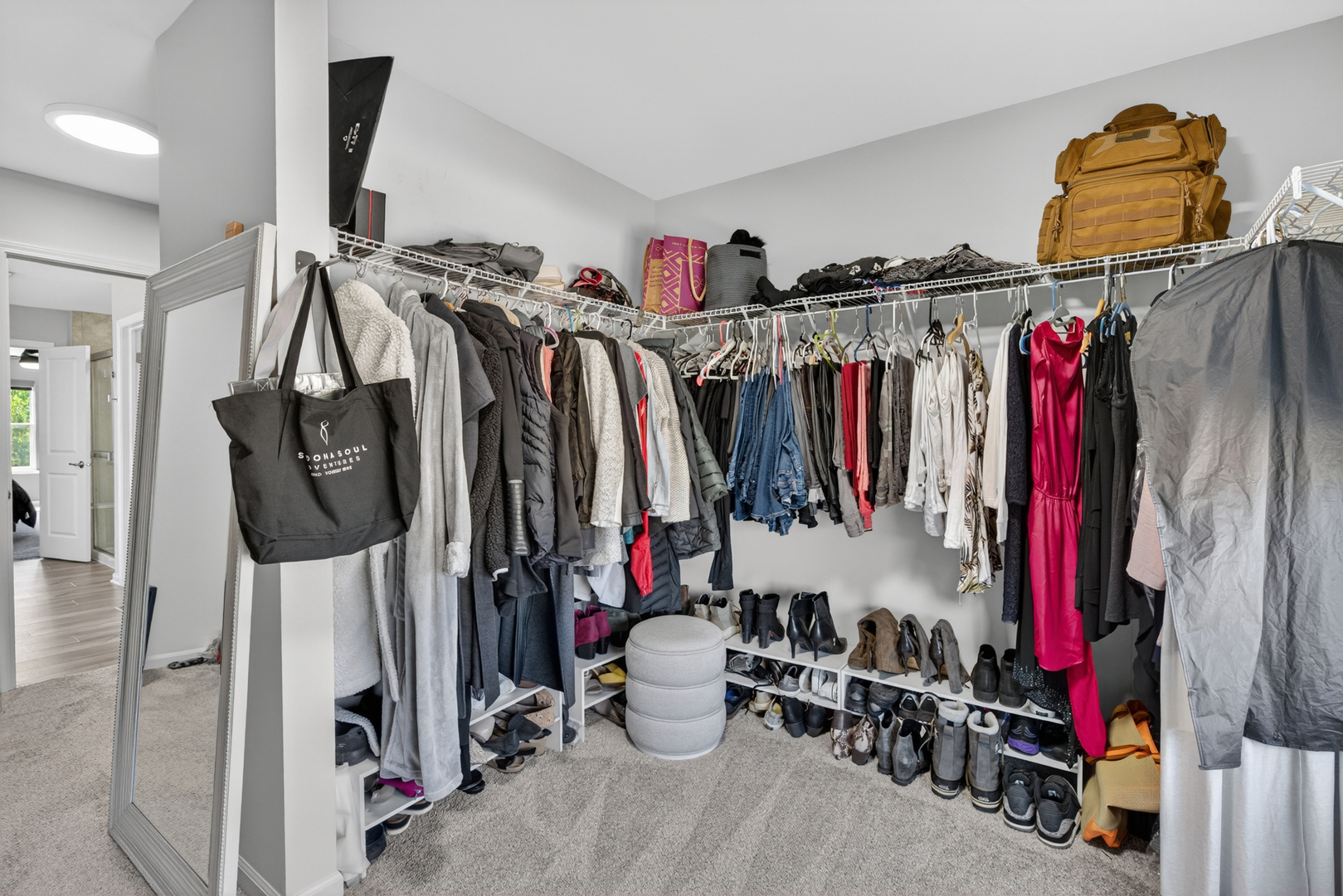 16230 Lake View Road Plainfield, IL 60586 - Photo 40 of 62 a view of walk in closet with clothes