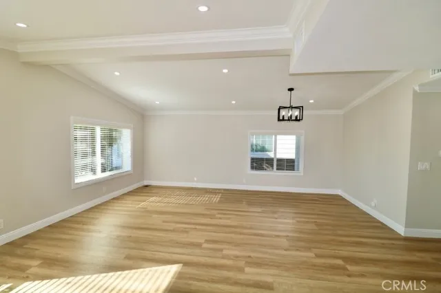 a view of a living room and kitchen