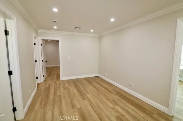a view of kitchen with sink microwave and refrigerator