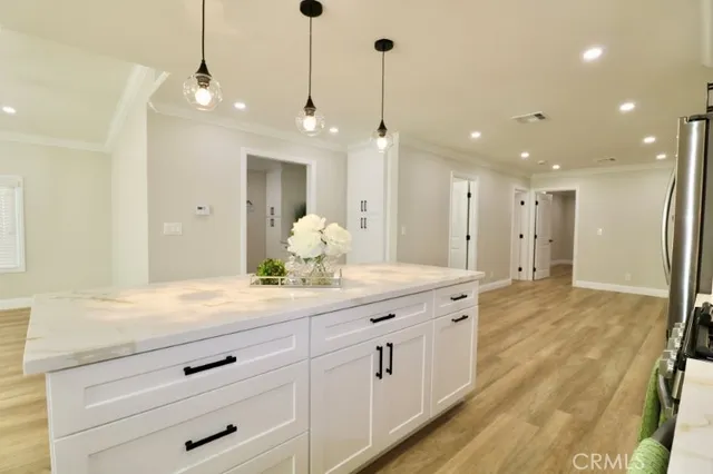 a bathroom with a shower sink and mirror