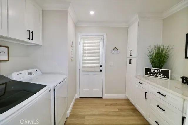 a bathroom with a sink mirror and vanity