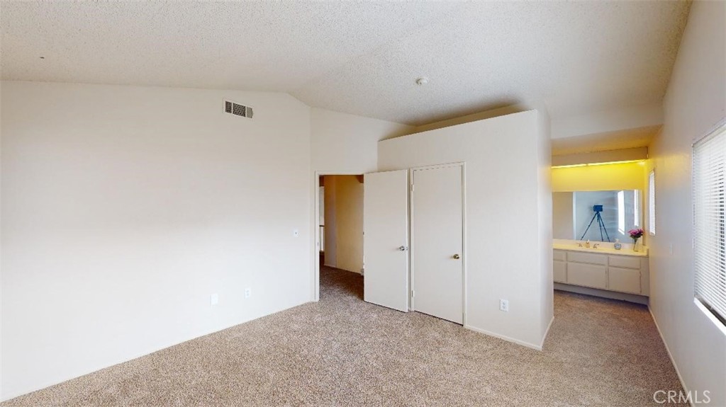 12246 Pluto Drive Victorville, CA 92392 - Photo 40 of 64 a view of an empty room
