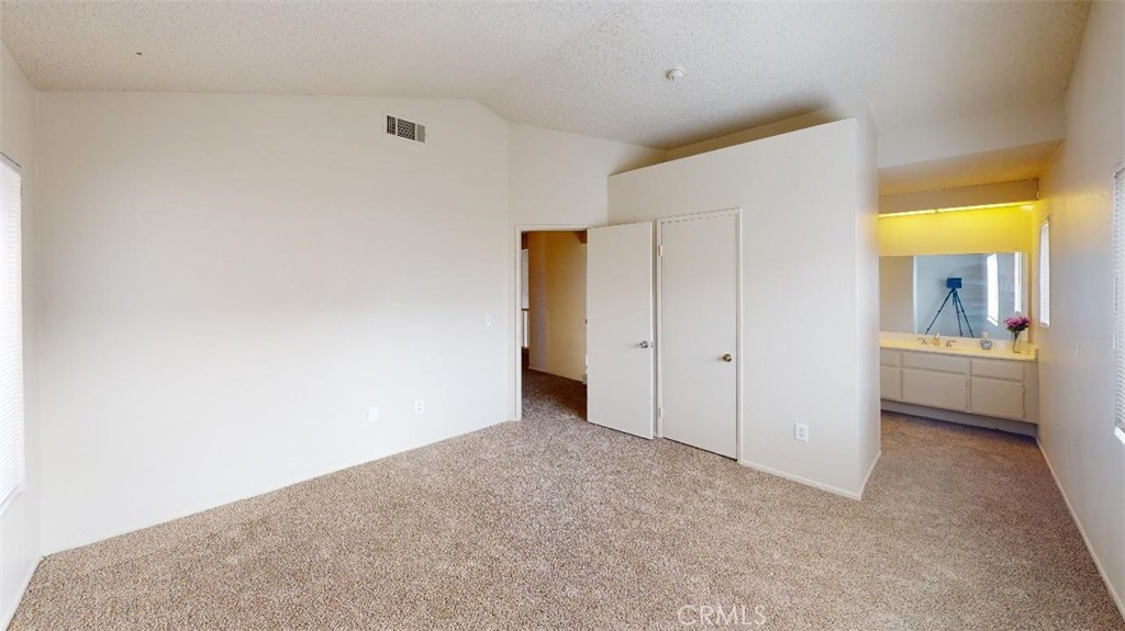 12246 Pluto Drive Victorville, CA 92392 - Photo 51 of 64 a view of an empty room
