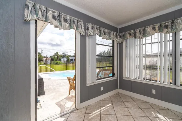 a view of an empty room and window