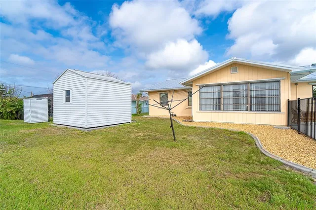 a view of a backyard with a garden