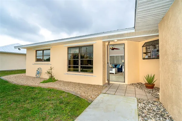 a front view of a house with patio