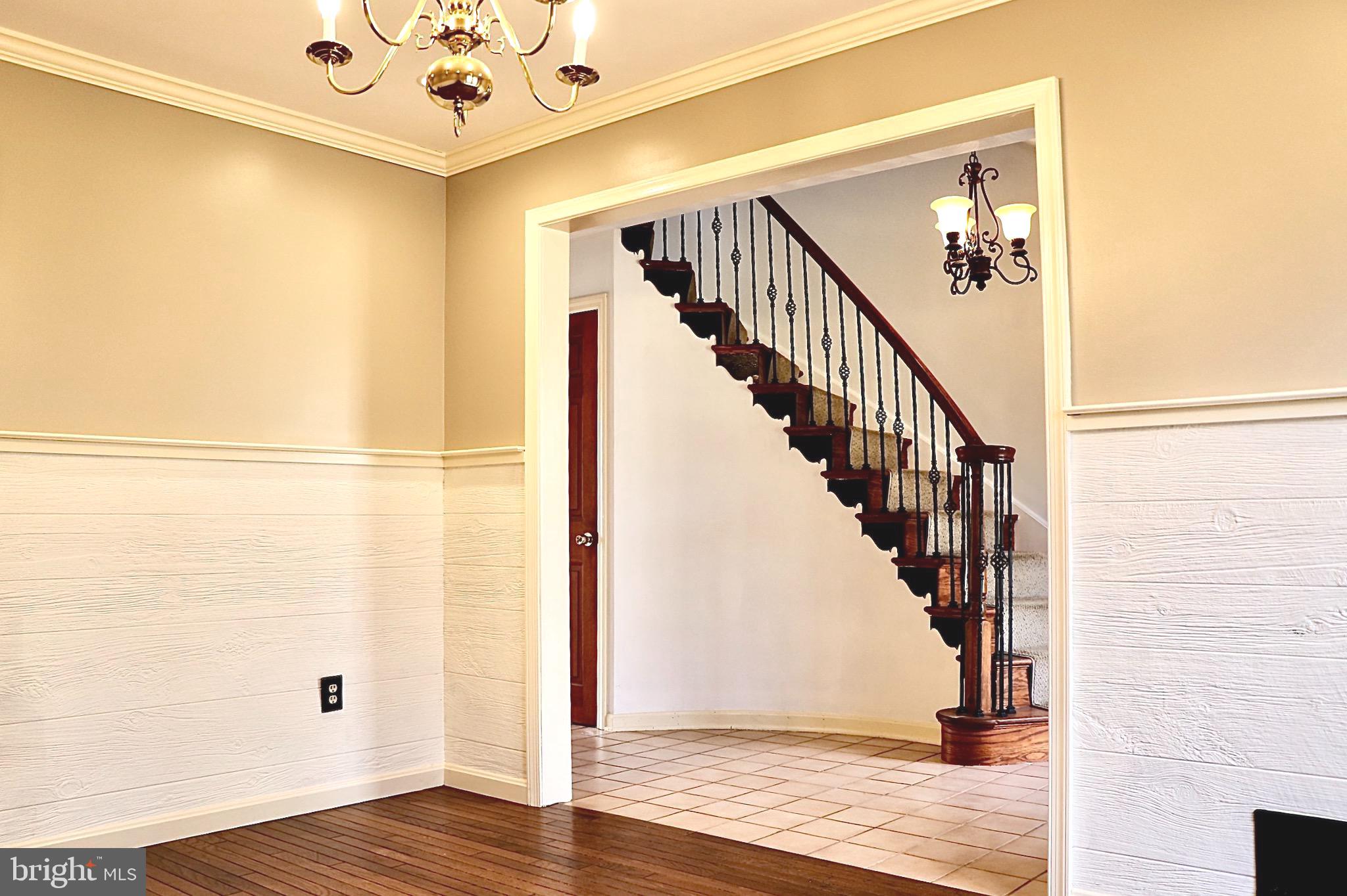 Formal dining to the left of the grand entrance