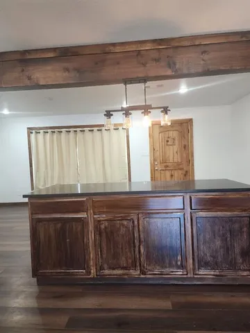 a close view of sink and cabinets