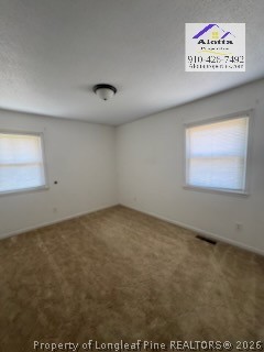338 Summerhill Road Fayetteville, NC 28303 - Photo 13 of 28 an empty room with a window