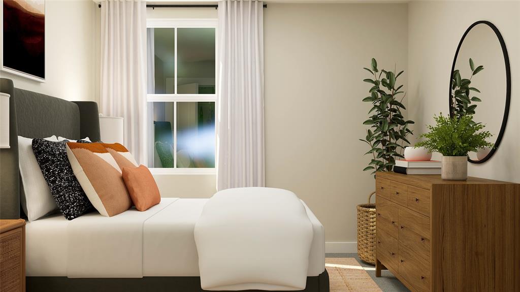 710 Lacewing Drive Arlington, TX 76005 - Photo 11 of 15 a bedroom with a bed and a potted plant