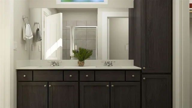 a view of bathroom with sink and mirror