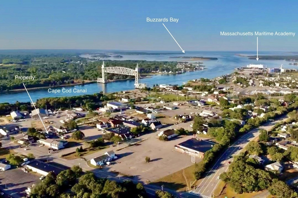 151-153 Main Street Bourne, MA 02532 - Photo 1 of 22 an aerial view of a city