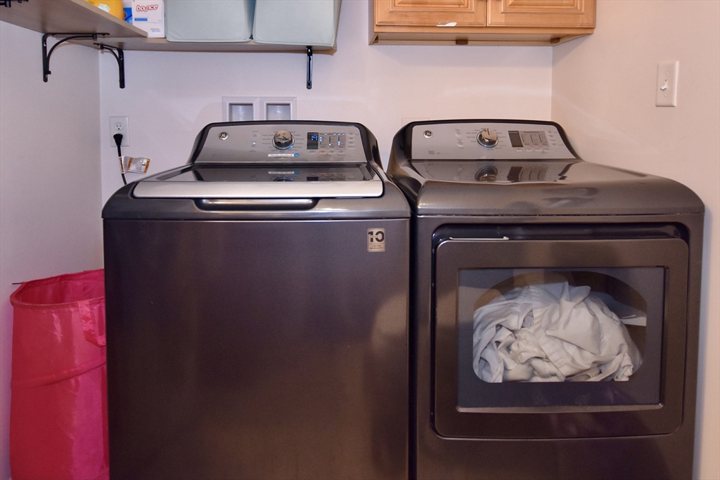 151-153 Main Street Bourne, MA 02532 - Photo 6 of 22 a close view of a stove top oven sitting inside of a kitchen