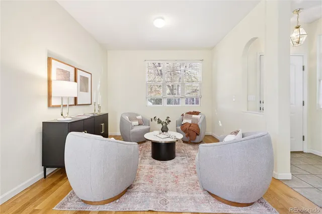 a living room with furniture and window