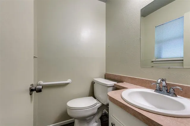 a bathroom with a sink and a toilet
