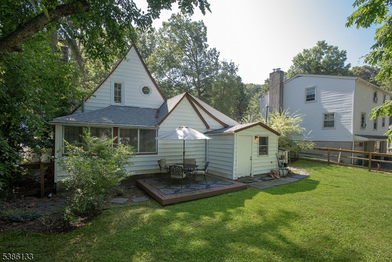 116 East Shore Trail Sparta, NJ 07871 - Photo 5 of 17 a view of a house with a yard and sitting area