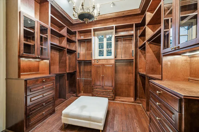 a spacious bathroom with a shower sink mirror and vanity